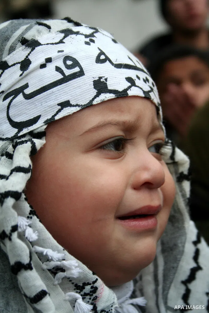 Palestinian Fatah militants, loyal to their leader Mahmud Abbas, participate in a rally in Gaza City to celebrate 42 years since the party's founding. Abbas dug in his heels in a standoff with the ruling Hamas movement t...