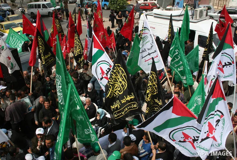 Palestinians gather in front of the red cross headquarters in Gaza through a protest calling for the release of Palestinian prisoners from Israeli jails.