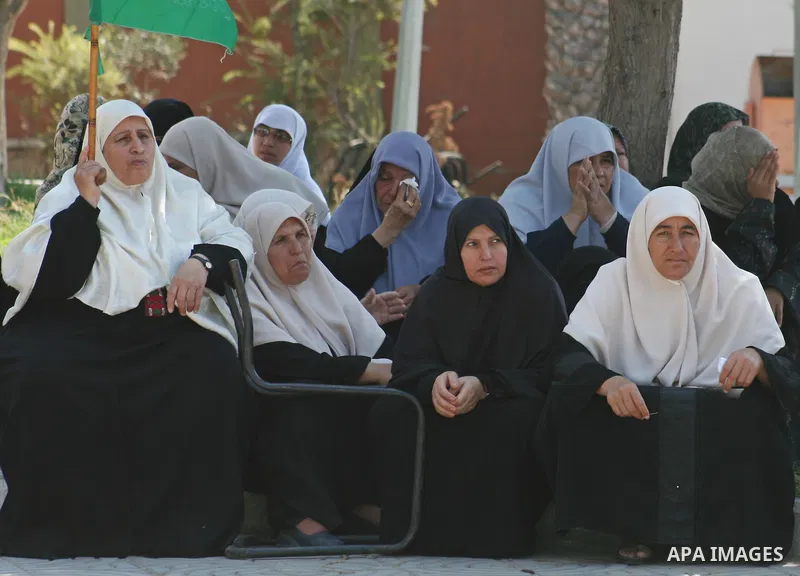 Palestinian women supporters of the Hamas movement gather during a demonstration in front of the legislative council in Gaza City. Palestinian women demanding to halt the palestinian authority forces's violences against...