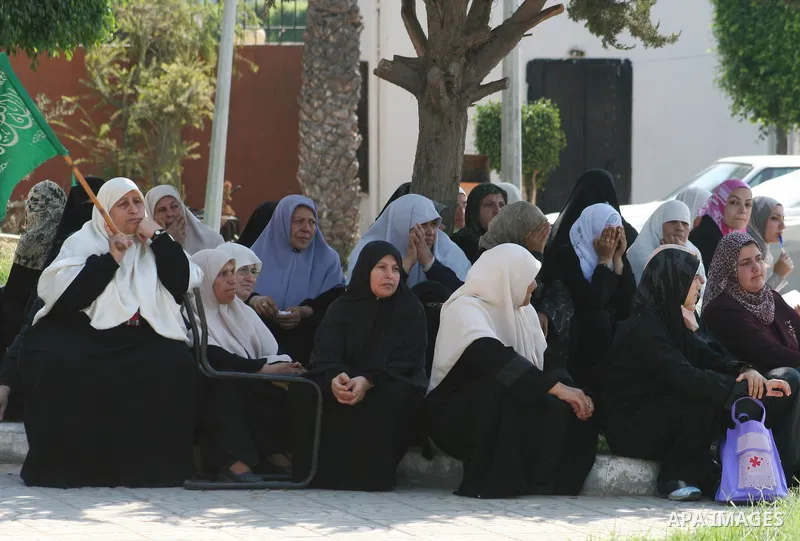 Palestinian women supporters of the Hamas movement gather during a demonstration in front of the legislative council in Gaza City. Palestinian women demanding to halt the palestinian authority forces's violences against...