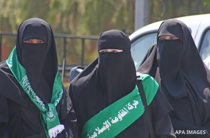 Palestinian women supporters of the Hamas movement gather during a demonstration in front of the legislative council in Gaza City. Palestinian women demanding to halt the palestinian authority forces's violences against...