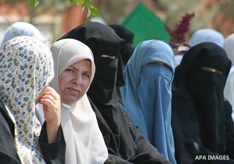 Palestinian women supporters of the Hamas movement gather during a demonstration in front of the legislative council in Gaza City. Palestinian women demanding to halt the palestinian authority forces's violences against...