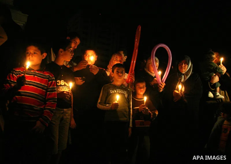 Palestinians hold candles as they march during a demonstration against the Israeli fuel cut, in Gaza City. Defense Minister Ehud Barak decided not to resume much-needed fuel shipments to the Gaza Strip on Monday because...