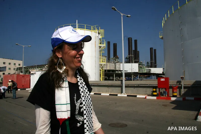 Foreign peace activists visit the main Palestinian electricity company in the al-Nuseirat refugee camp, central Gaza Strip. Palestinian officials in Gaza said yesterday that power supplies had been reduced by one third i...