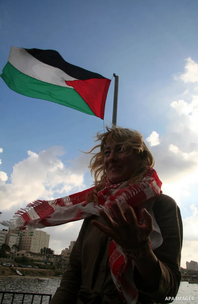 Palestinians receive a boat carrying a group of pro-Palestinian peace activists and European politicians upon its arrival in Gaza City. Israel allowed the "Dignity," a small yacht, to sail to the Gaza Strip in the fourth...