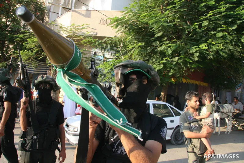 Palestinian Hamas militants take part in a rally held in the refugee camp of Nusseirat in the central Gaza Strip. Palestinian president Mahmud Abbas has rejected a call for talks with arch-rival Hamas ahead of early Nove...