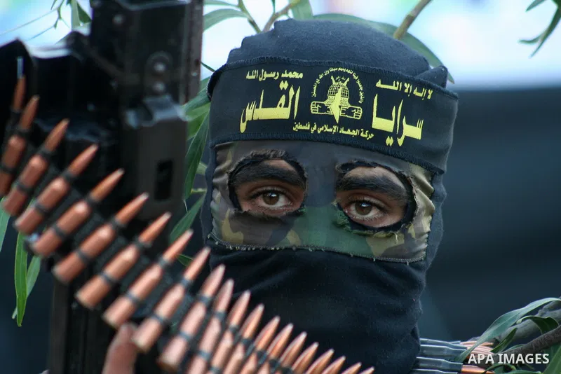Masked Palestinian militants from Islamic Jihad take part in a training exercise as they demonstrate their skills for journalists on the outskirts of Gaza City. Tension surged in and around Gaza today as the Islamist rul...