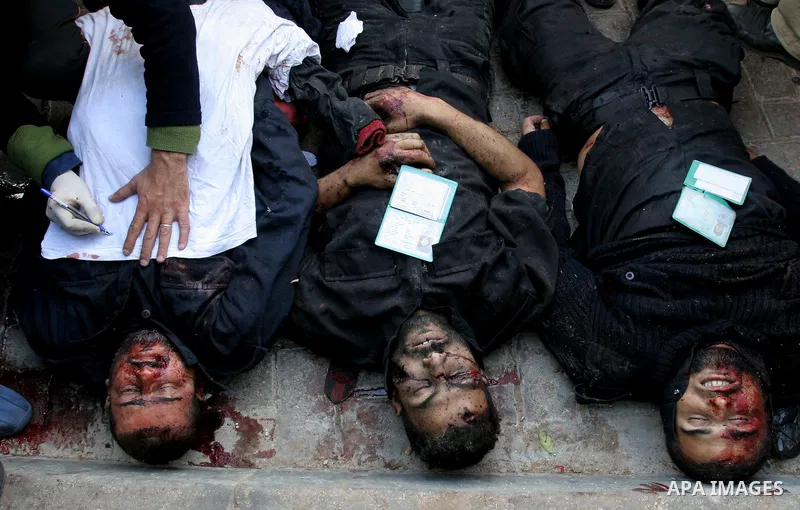 Bodies of Palestinians are seen at Shifa hospital in Gaza December 27, 2008. Israel's air force fired about 30 missiles at targets in the Gaza Strip on Saturday, destroying several Hamas police compounds and killing more...