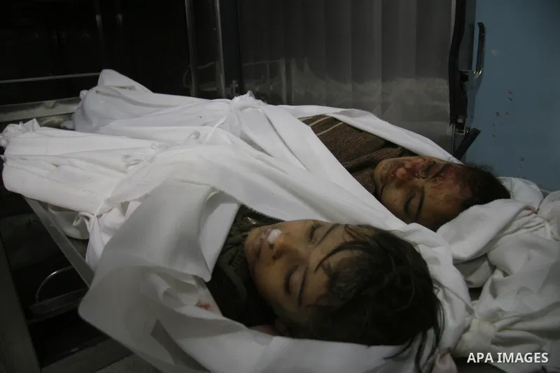 The bodies of two girls, aged four and 11, who were killed in an Israeli air strike in Beit Hanun in the northern Gaza Strip. Israel has rejected global appeals for a truce while massing its forces along the Gaza border...