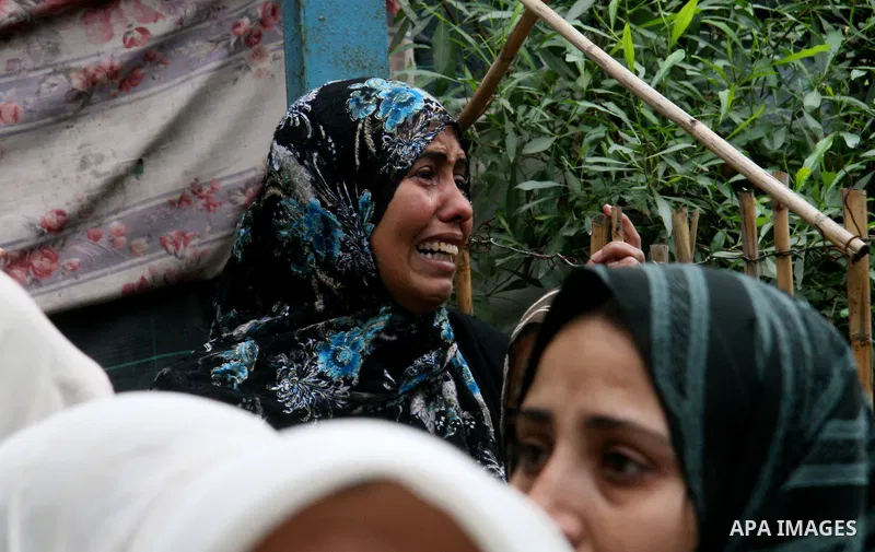 Palestinian relatives of 4-year-old girl, Haya Hamdan, killed with her sister, Lama, 12, in an Israeli missile strike, mourn during her funeral in town of Beit Hanoun, northern Gaza Strip, Tuesday, Dec. 30, 2008. Israeli...