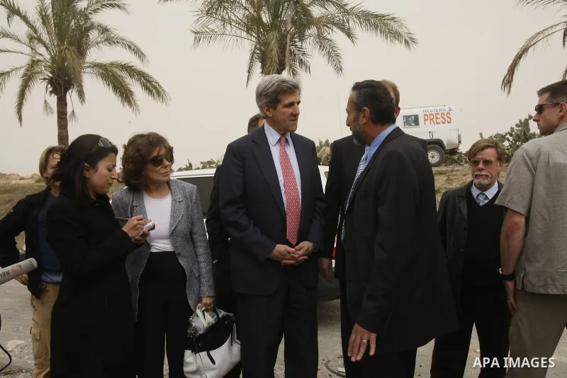 US Senator John Kerry (R) visits on February 19, 2009 the destroyed American International School in Beit Lahia in the northern Gaza Strip, that was bombed during Israel's 22-day offensive on the Palestinain enclave. Ker...