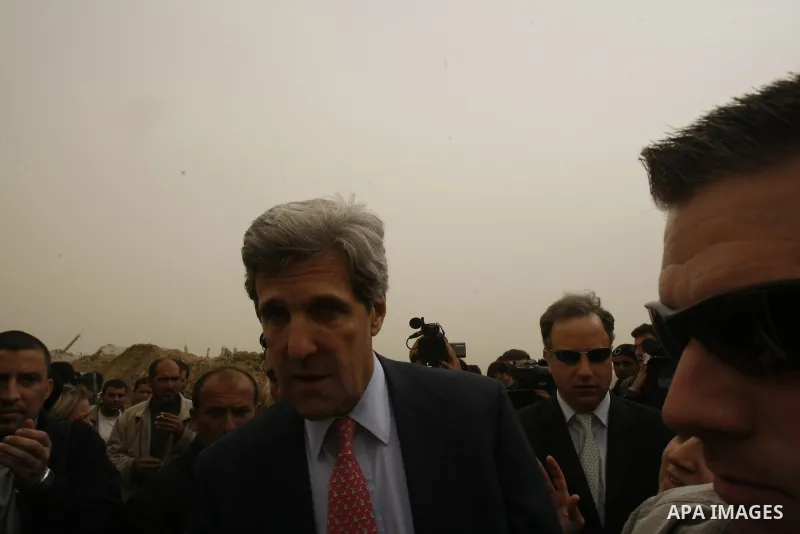 US Senator John Kerry (R) visits on February 19, 2009 the destroyed American International School in Beit Lahia in the northern Gaza Strip, that was bombed during Israel's 22-day offensive on the Palestinain enclave. Ker...