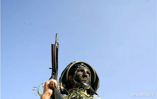 New members of the Islamic Jihad fighters blow up a building as they attend a military show in the former Israeli jewish settlement of Atsmona in Rafah, southern of Gaza Strip. Saraya Al-Quds the military wing of the Pal...