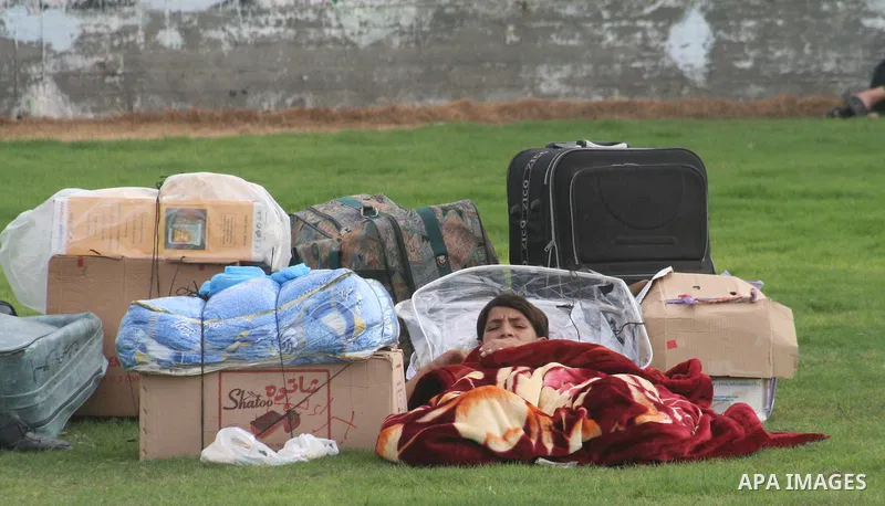 Palestinians wait to cross into Egypt from Rafah border crossing in the southern Gaza Strip. Egypt opened its border crossing with the Gaza Strip on Saturday, allowing hundreds of people to leave the Hamas-controlled ter...