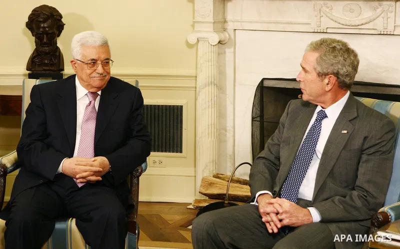 Palestinian President Mahmoud Abbas meets with U.S. President George W. Bush at the White House in Washington.
