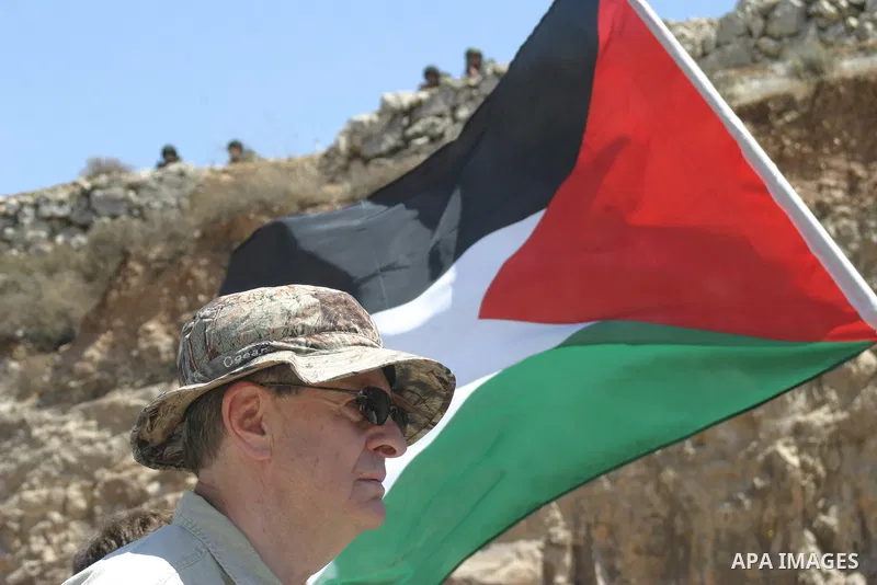 Palestinian and foreign demonstrators during a protest against the construction of the controversial separation barrier in the village of Al-Khader near the West Bank city of Bethlehem.