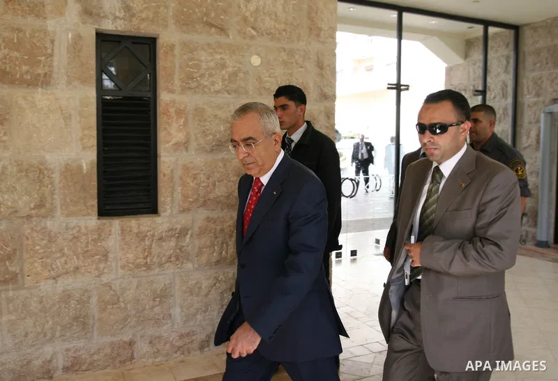 Palestinian Prime Minister Salam Fayyad arrives for the opening of the Palestine Investment Conference in the West Bank city of Bethlehem. Bethlehem is hosting a three-day Palestinian business conference where nearly US$...
