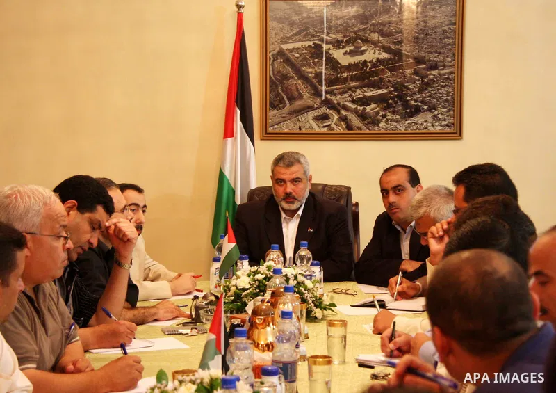 Palestinian Prime Minister of hamas Ismail Haniyeh receives a delegation from the correspondents of local and arabian mass media.