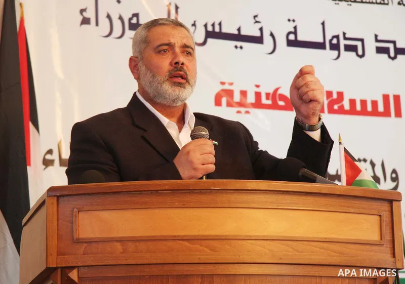 Palestinian Prime Minister of Hamas Ismail Haniyeh addresses during the ceremony of distribution compensation for families of Victims who was killed by Israeli incursion northern Gaza Strip in March 2008, in Gaza City.