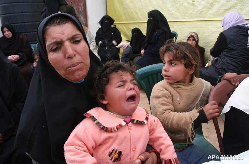 Palestinian relatives of 10-year-old Tamir Abu Shair, who was killed by Israeli soldiers on Tuesday, mourns during his funeral in Deer El-Balah city, central Gaza Strip. Israeli soldiers shot and killed a 10-year-old boy...