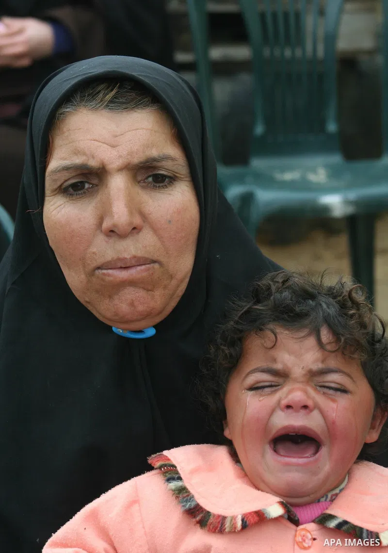 Palestinian relatives of 10-year-old Tamir Abu Shair, who was killed by Israeli soldiers on Tuesday, mourns during his funeral in Deer El-Balah city, central Gaza Strip. Israeli soldiers shot and killed a 10-year-old boy...
