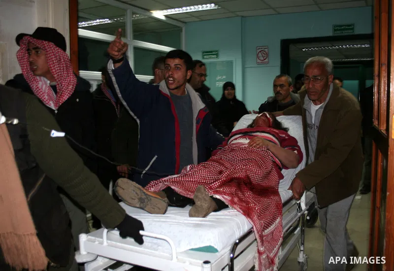 Wounded Palestinians are seen in hospital following an explosion at the home of senior Islamic Jihad leader Ayman Atallah Fayed in the Al-Burij refugee camp in Al-Burij, central Gaza Strip. At least nine people were kill...