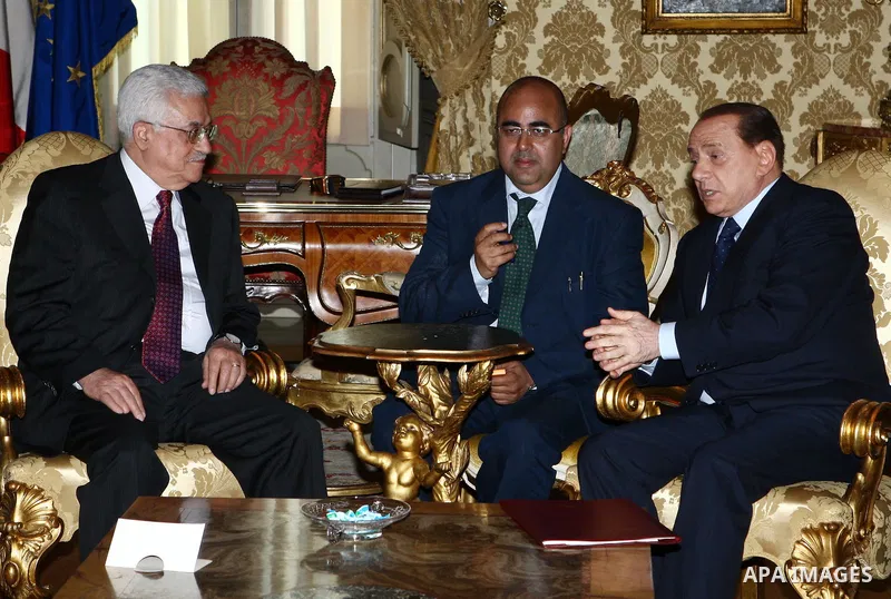 Palestinian President Mahmoud Abbas meets Italy Prime Minister Silvio Berlusconi, in the Italian capital of Rome.