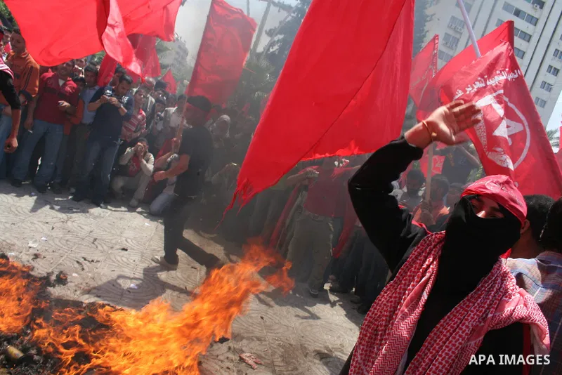 Palestinian workers take part in a protest against the lack of employment opportunities in Gaza City April 30, 2009, a day before World Labour Day APAIMAGES PHOTO / Ashraf Amra