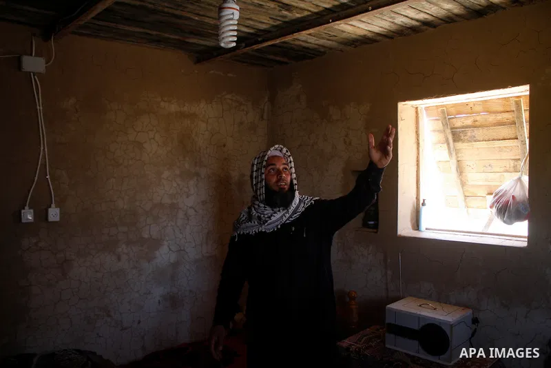 Palestinians build a house with clay, after their home was destroyed in Israel's last military operation in Gaza, in the Rafah refugee camp, southern Gaza Strip. Many parts of the Hamas-run Gaza Strip are still in ruins...