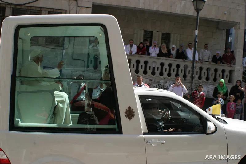 Pope Benedict XVI celebrates a Holy Mass in Manger Square May 13, 2009 in Bethlehem, West Bank. During his visit marred by controversy over his wartime past as a member of the Nazi's Hitler Youth, the Pontiff called for...