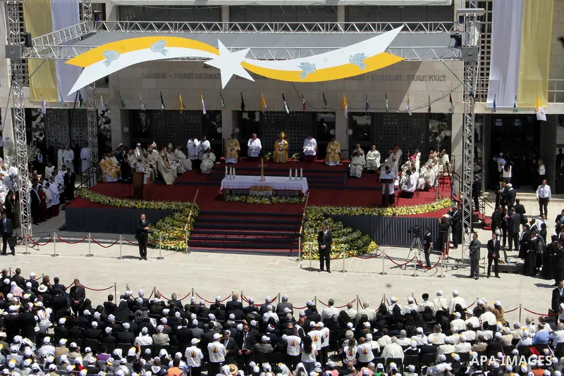 Pope Benedict XVI celebrates a Holy Mass in Manger Square May 13, 2009 in Bethlehem, West Bank. During his visit marred by controversy over his wartime past as a member of the Nazi's Hitler Youth, the Pontiff called for...
