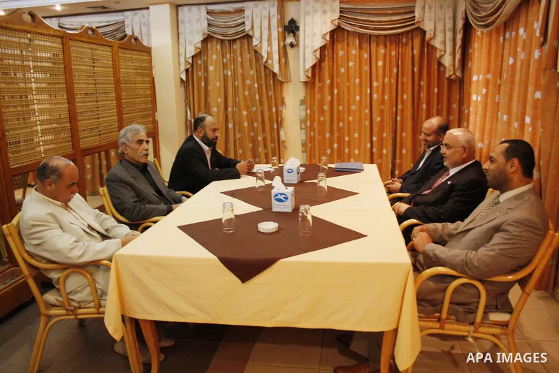 Palestinian Fatah officials (from front-L) Abdullah Abu Samhadana, Ibrahim Abu al-Naja and Ashraf Jomaa meet with Hamas officials Ayman Taha, Jamal Abu Hashem and Ismail al-Ashkar in Gaza city on June 14, 2009. The two m...