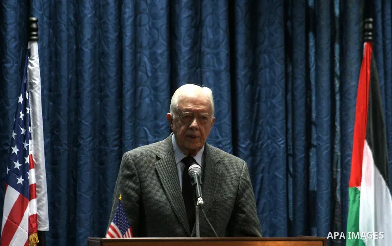 Former US President Jimmy Carter attend a joint press conference with Ismail Haniya, prime minister of the Islamist Hamas movement, in Gaza City on June 16, 2009. Carter was visiting the Hamas-run Gaza Strip, after urgin...