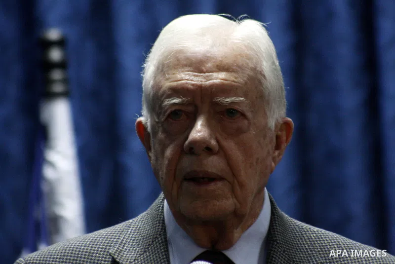 Former US President Jimmy Carter attend a joint press conference with Ismail Haniya, prime minister of the Islamist Hamas movement, in Gaza City on June 16, 2009. Carter was visiting the Hamas-run Gaza Strip, after urgin...