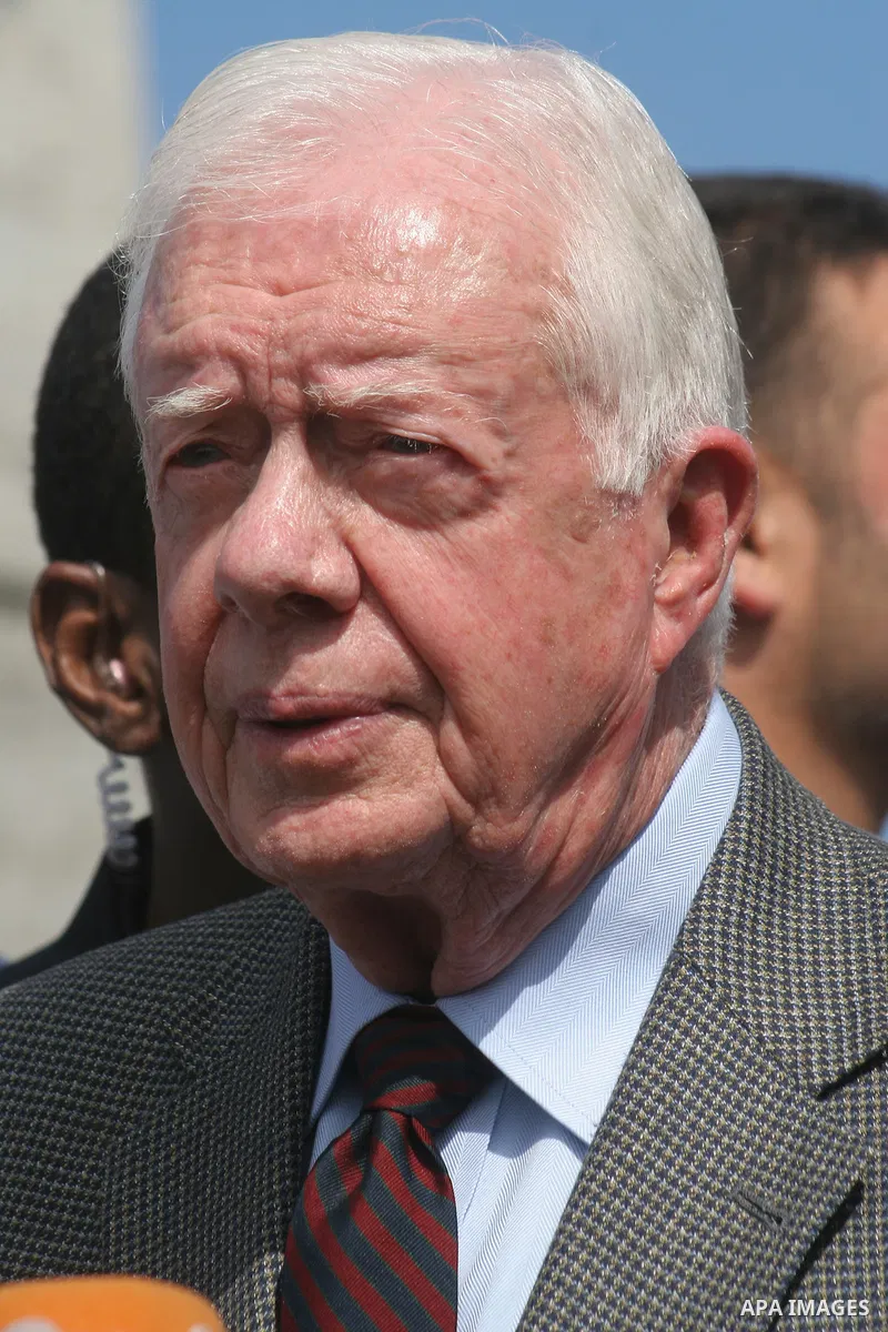 Former US President Jimmy Carter inspect the damages of the American International School which was destroyed during the December-January Israeli offensive in Beit Lahia in the northern Gaza strip on June 16, 2009. Carte...
