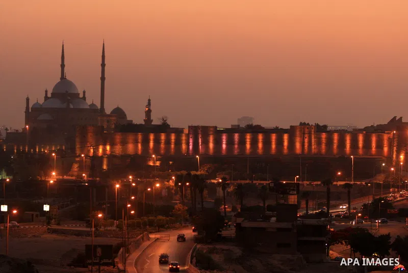 The sun sets over the Mohammad Ali Mosque at the castle in Cairo, capital of Egypt on June 14, 2009. photo by Wissam Nassar