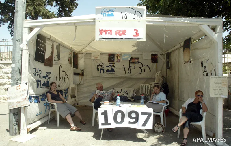 An Israelis sit at The solidarity tent, calling to release of the captured Israeli soldier, Gilad Shalit in the West Jerusalem on June 26, 2009. Photo by Mahfuz Abu Turk