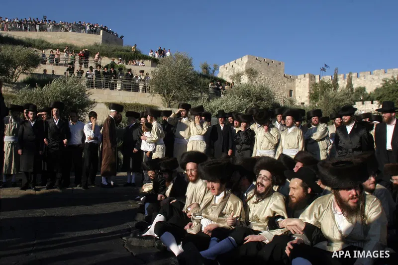 Ultra-Orthodox demonstrators scuffle with police during a protest in Jerusalem July 11, 2009 against the opening of a parking lot on the Jewish sabbath. Ultra-Orthodox Jews have clashed with police several times in the p...