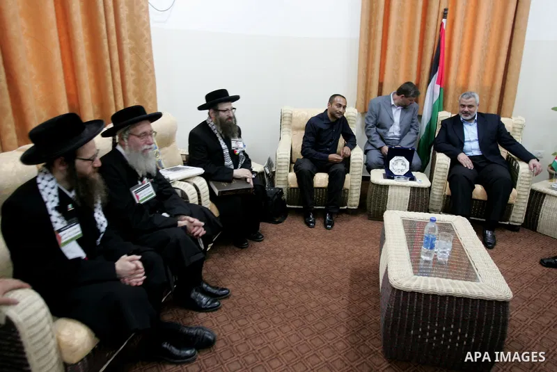 Palestinian Prime minister of Hamas Ismail Haniya meets U.S. members of Neturei Karta, a fringe ultra-Orthodox movement within the anti-Zionist bloc, during their visit to Gaza City July 16, 2009. About 200 international...