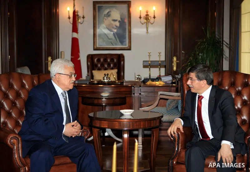 Palestinian President Mahmoud Abbas meets with Turkish Foreign Minister Ahmed Dawood Oglu in Ankara on July 17, 2009. Photo by Omar Rashidi