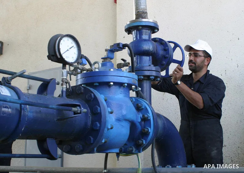 A Palestinian worker during the opening the water project and the hole Rashaida Arabs and the line carrier and the electrical link to the wells in the province of Bethlehem in Rashaida Arabs village near the West Bank to...