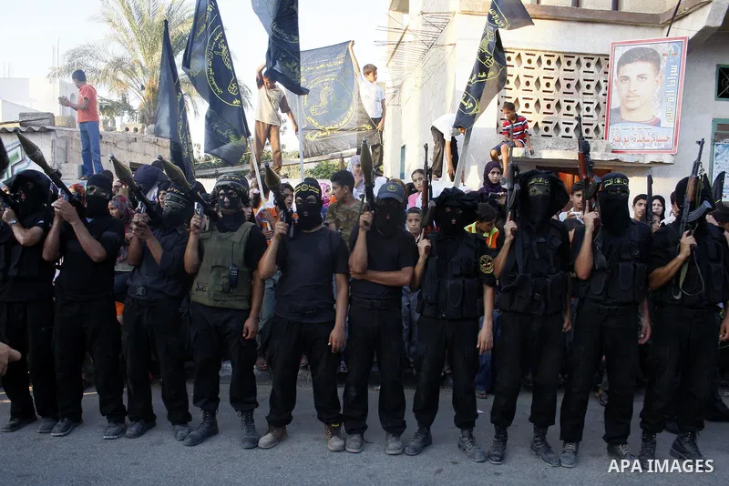 Palestinian fighters of the Islamic Jihad movement during a rally in the Khan Yunis refugee camp in the southern Gaza Strip on July 24, 2009. Photo By Ashraf Amra