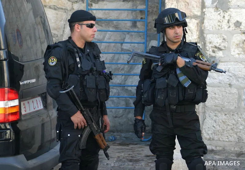 Palestinian Security forces patrol streets outside the sixth Fatah conference square in the West Bank town of Bethlehem August 6, 2009. Photo by Najeh Hashlamoun