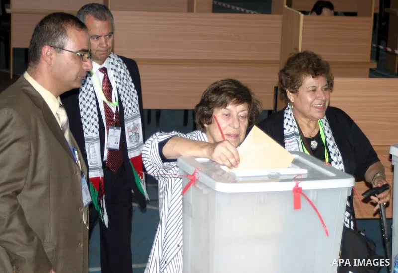 A member of Fatah electing at the ballot boxes for elections to both the Central Committee and the Revolutionary Council during the Fatah sixth conference election in the West Bank town of Bethlehem on 09 August 2009. Ph...