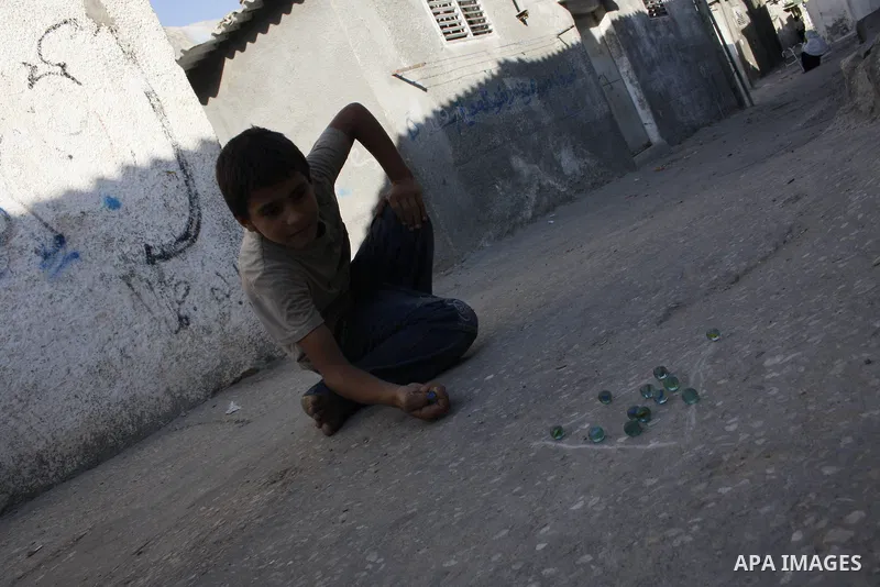 A Palestinian refugees seen in the narrow roads at Deir al-Balah refugee camp central Gaza Strip on Aug 17, 2009. The United nations for relief and work agency "UNRWA" call on the international community to pay 181 milli...