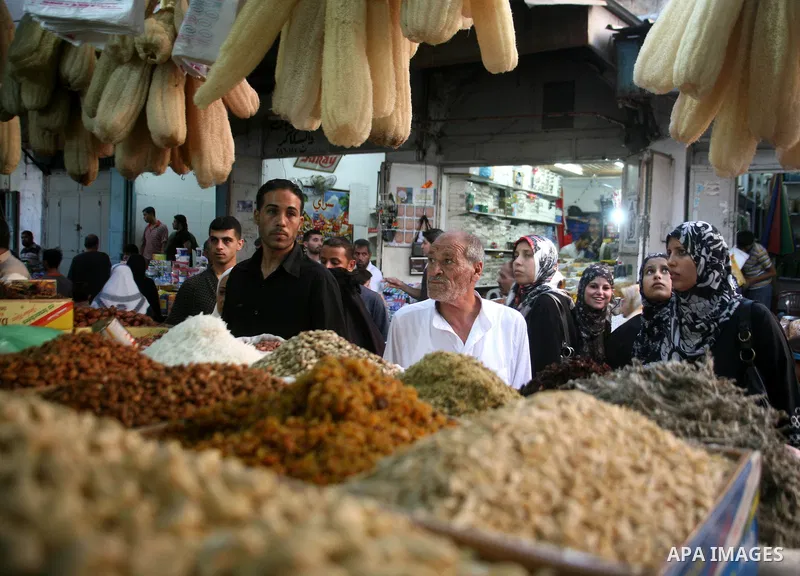 A Palestinians shop at a popular market during preparing for Islam's holy month of Ramadan in Gaza City on August 20, 2008. Ramadan is a Muslim religious observance that takes place during the ninth month of the Islamic...
