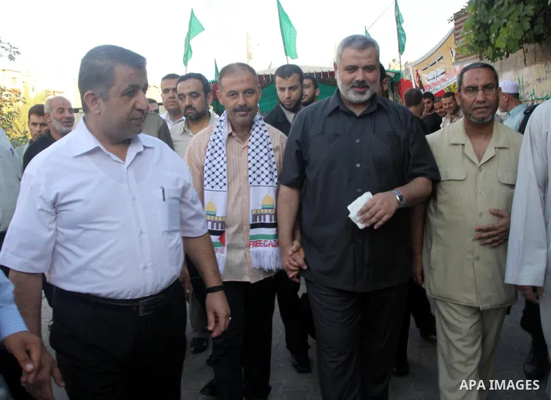 Palestinian prime minister of hamas Ismail Haniya visits Palestinian freed prisoners from Israeli Jails, in Gaza city on Aug 21, 2009. Photo By Mohammed Asad