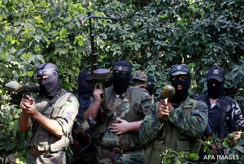 A militants of Al-Nasser Salah Al-Deen brigades attend a military training in Gaza city on Aug 27,2009..A Palestinian were killed during Israeli incursion northern Gaza strip, The militants said that they expect a wide I...