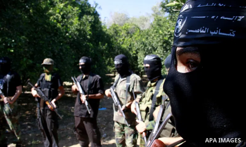 A militants of Al-Nasser Salah Al-Deen brigades attend a military training in Gaza city on Aug 27,2009..A Palestinian were killed during Israeli incursion northern Gaza strip, The militants said that they expect a wide I...