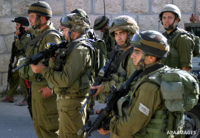 Israeli soldiers during a military operation in the village of Beit Ula West the West Bank city of Hebron, on Sep 22, 2009. Photo by Najeh Hashlamoun